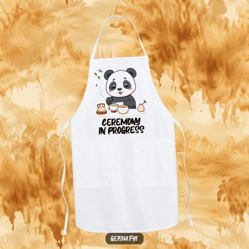 Funny apron featuring a panda hilariously attempting a tea ceremony, perfect for kitchen humor.