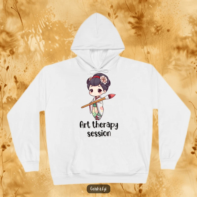 Cozy funny geisha character humorously holding a large paintbrush mid-stroke on this artistic and funny hoodie.